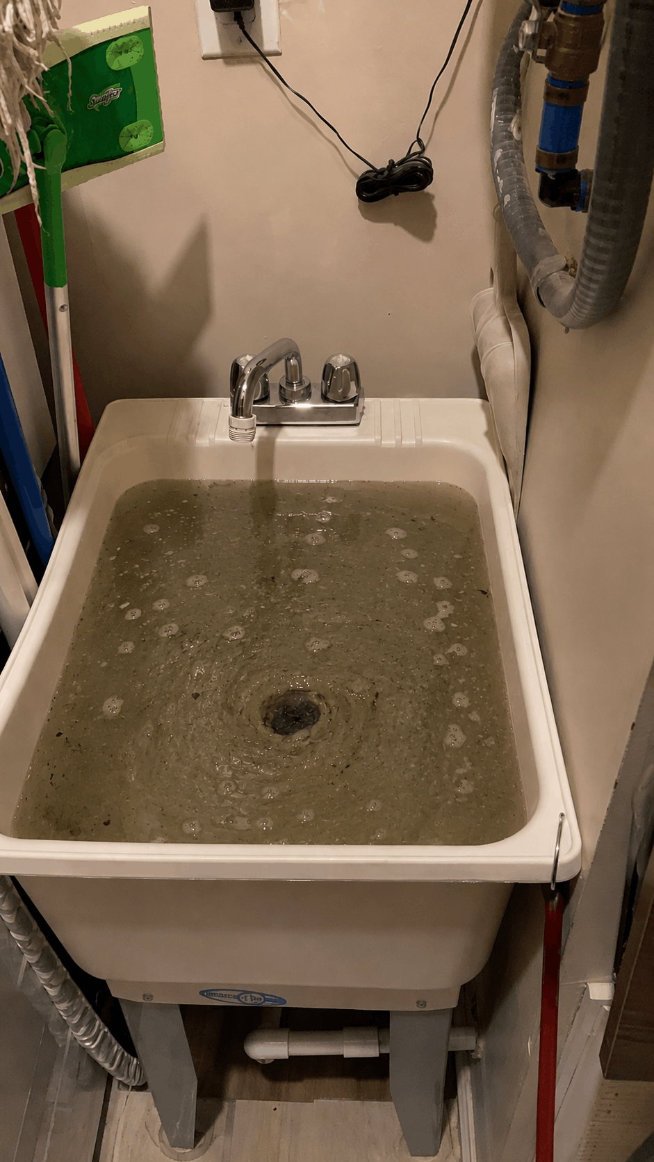 Laundry sink and washer drain setup