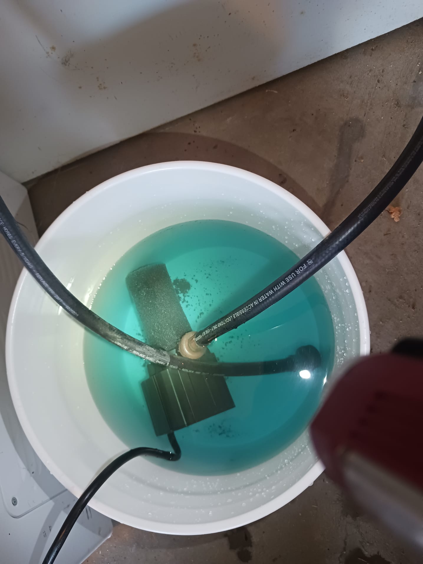 Washer drain overflow point near standpipe